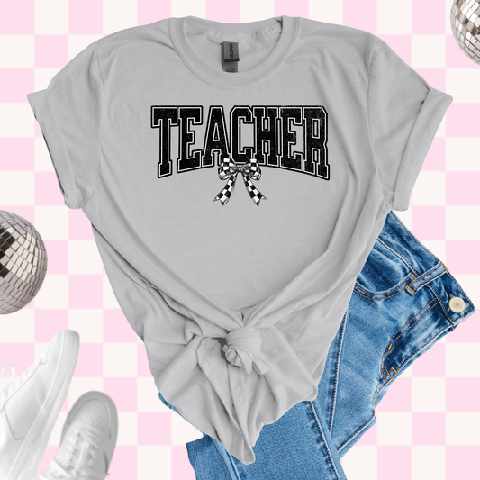 Teacher with checkered bow tshirt