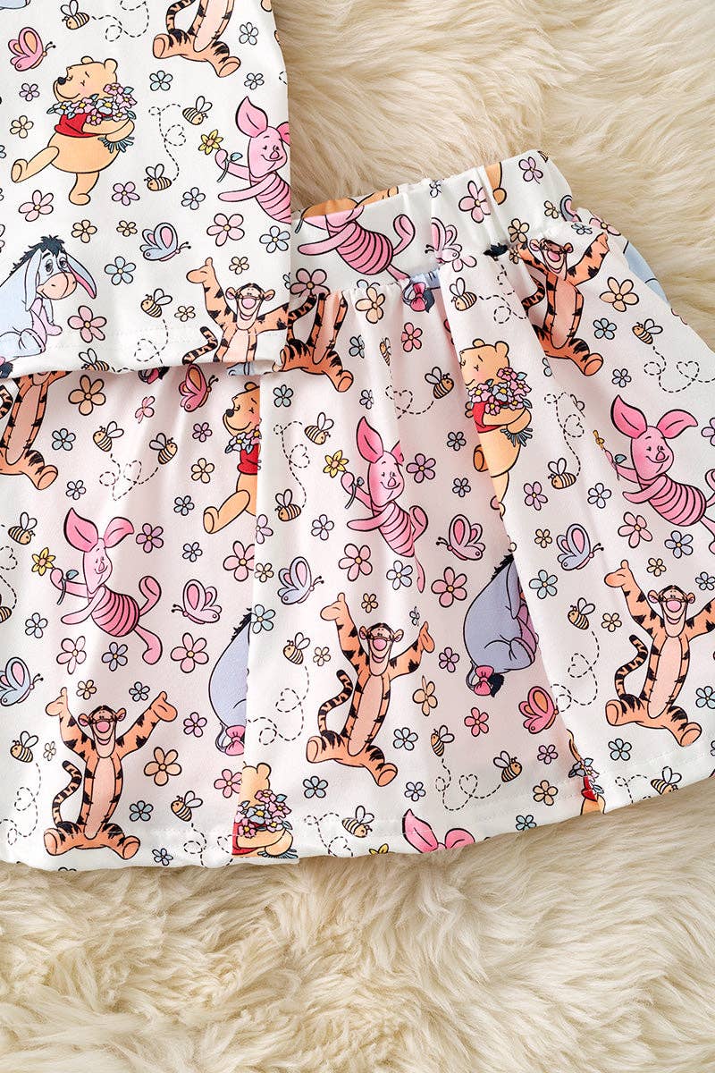 Character printed top & skort. OFG52573 AMY