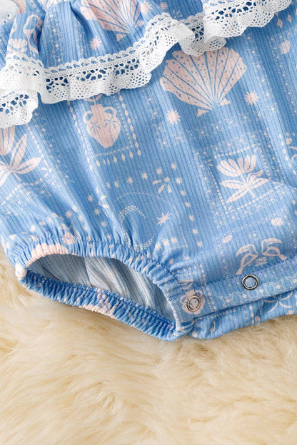 White seashell on blue baby bodysuit w/snaps. RPG50643 AMY