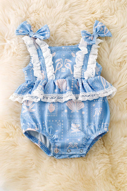 White seashell on blue baby bodysuit w/snaps. RPG50643 AMY