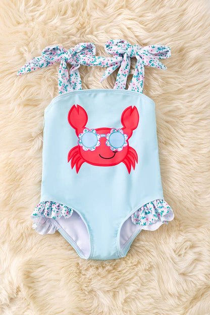 Crab applique on blue bodysuit. SWG60122 SOL